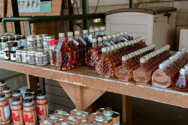 Shelves of maple syrup for sale