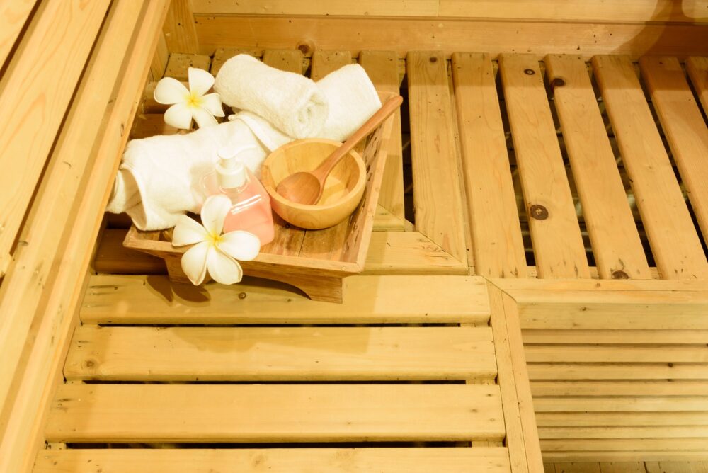 Sauna room with traditional sauna accessories